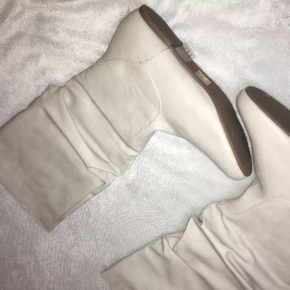 Worn once white boots